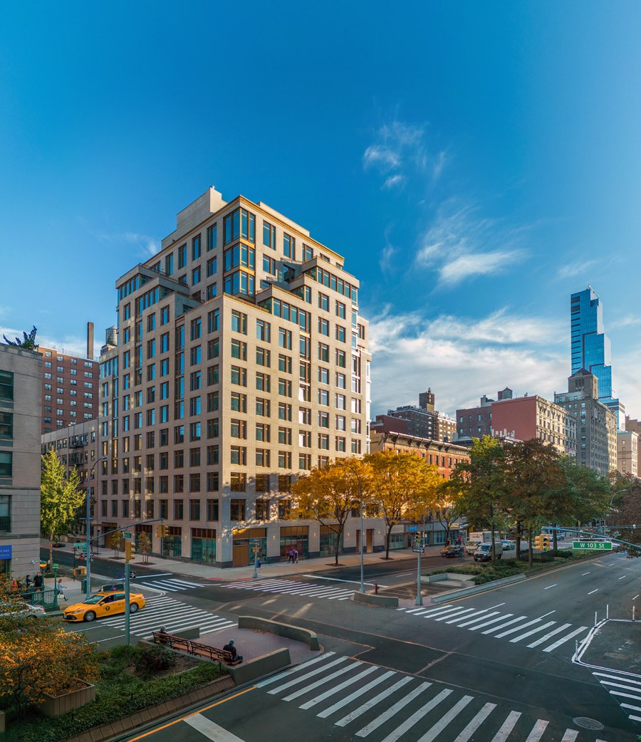 The Rockwell rises above Broadway and West 103rd Street, photographed from an elevated pole camera in New York City.